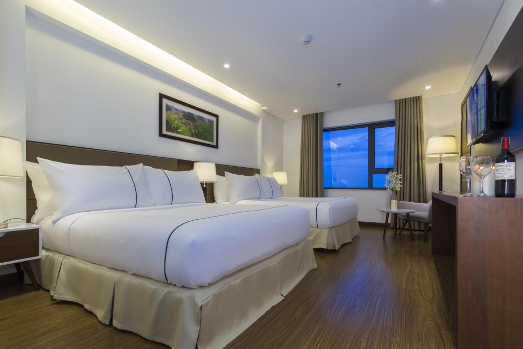 phòng ngủ khách sạn 4 sao biển mỹ khê đà nẵng
